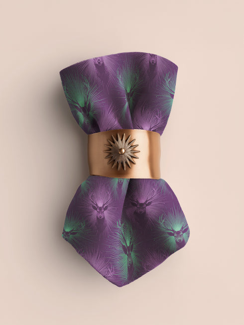 a purple and green tie with a flower on it